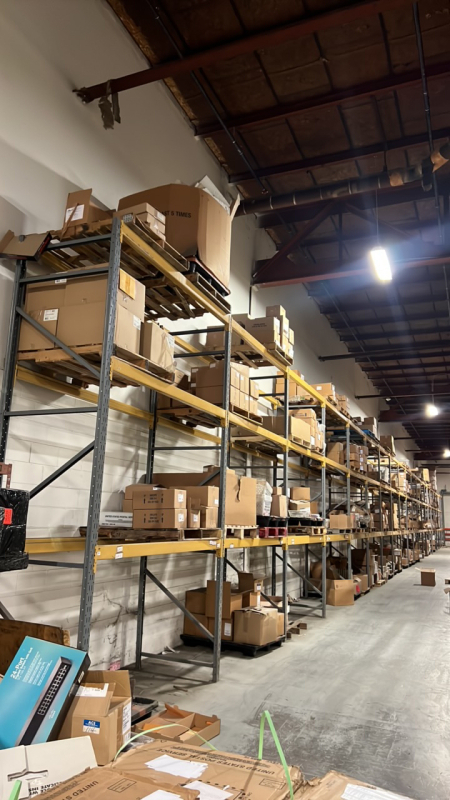 Warehouse liquidation loaded with pallet racking, fans, shelving & more!