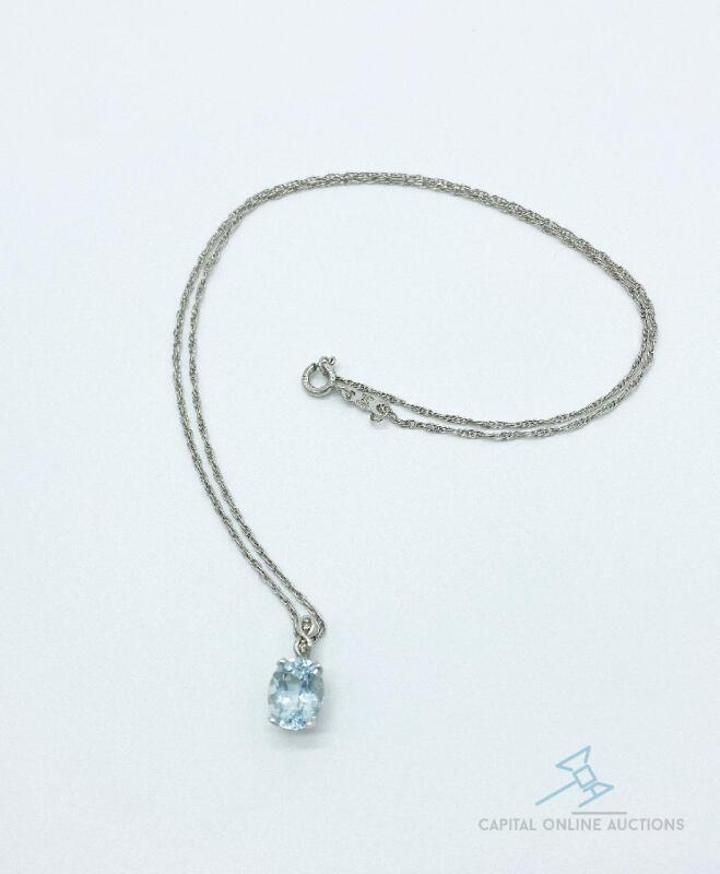 10kt Gold Blue Topaz and Diamond Pendant