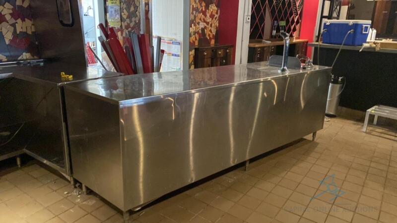 Tap Dispenser on Stainless Steel Table with Sink