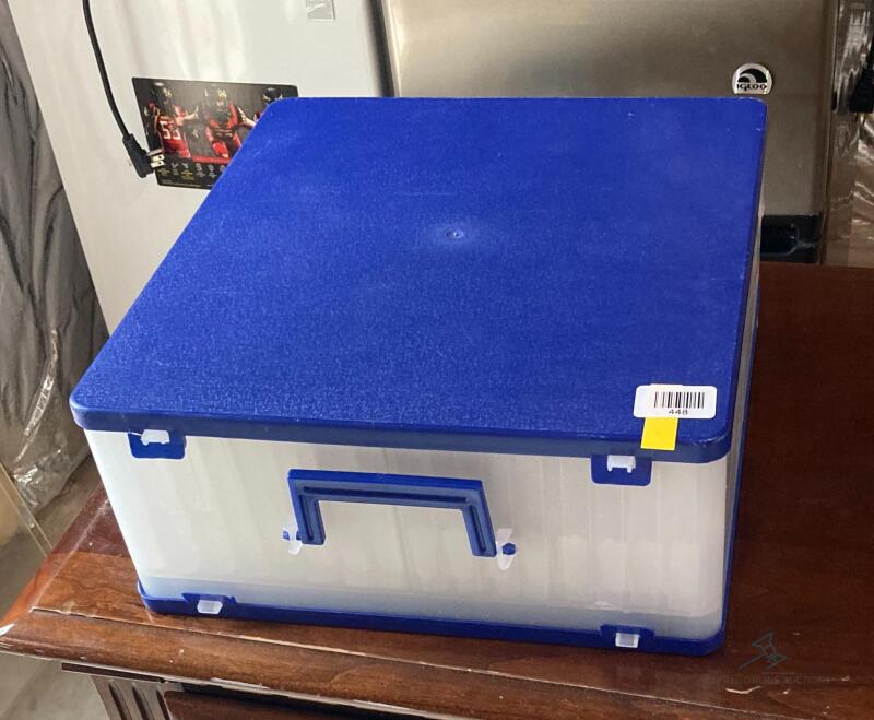 Plastic blue and clear storage container