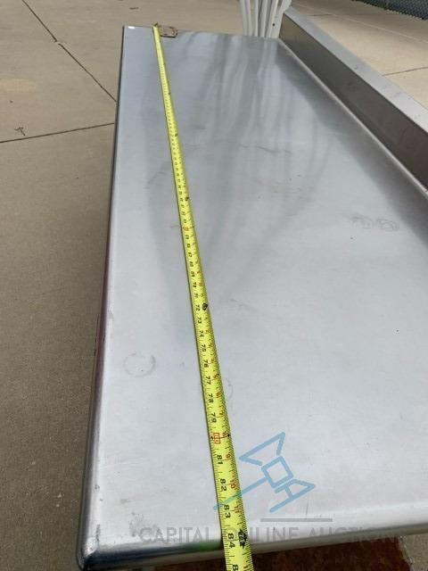 Stainless Steel Table with Can Opener on Left