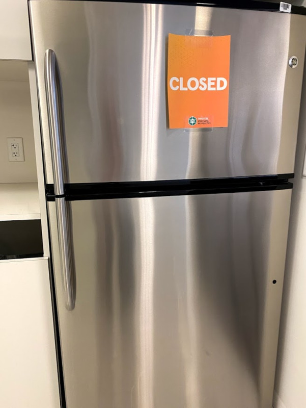 Stainless steel refrigerator with top freezer