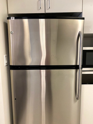 Stainless Steel refrigerator with top freezer