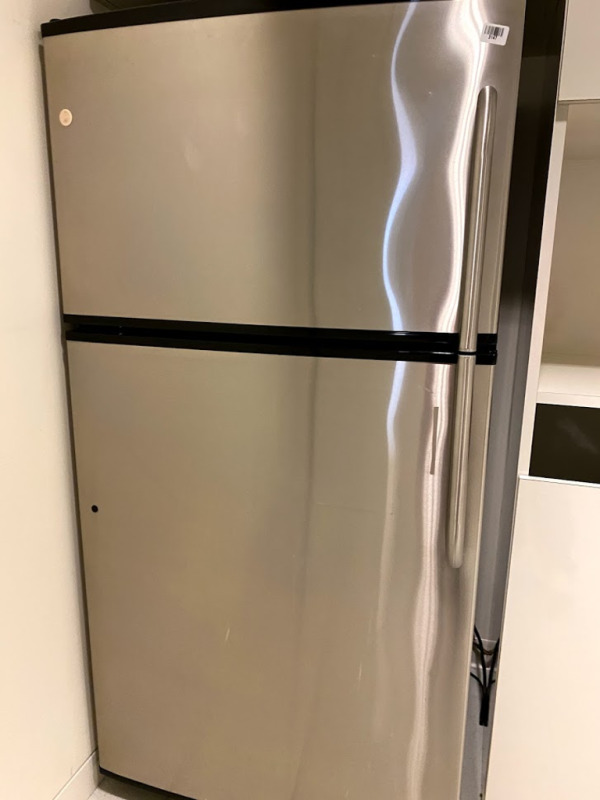 Stainless Steel refrigerator with top freezer