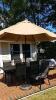 Patio umbrella and base plus two extra umbrellas