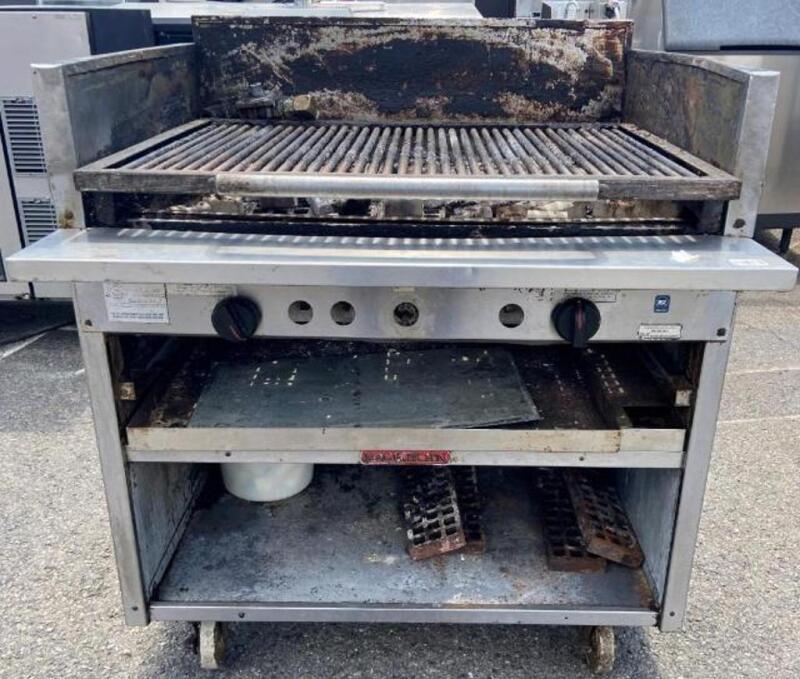 Grill with built in stand