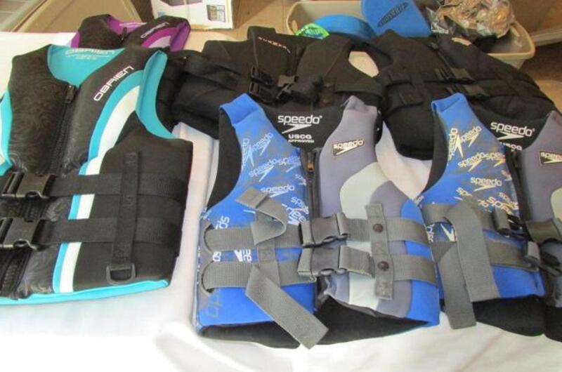 Water sports life  vests  2 OBriens  2 Subzeros 2 Speedos one bid price for entire lot