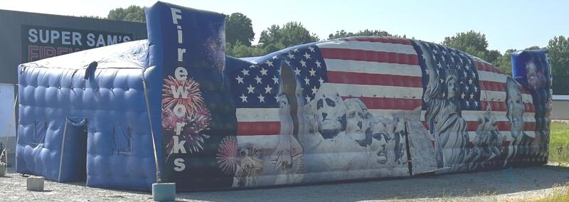 80'x23' Inflatable Tent with Fireworks Graphics(can be covered up with banner). NOTE Updated Length
