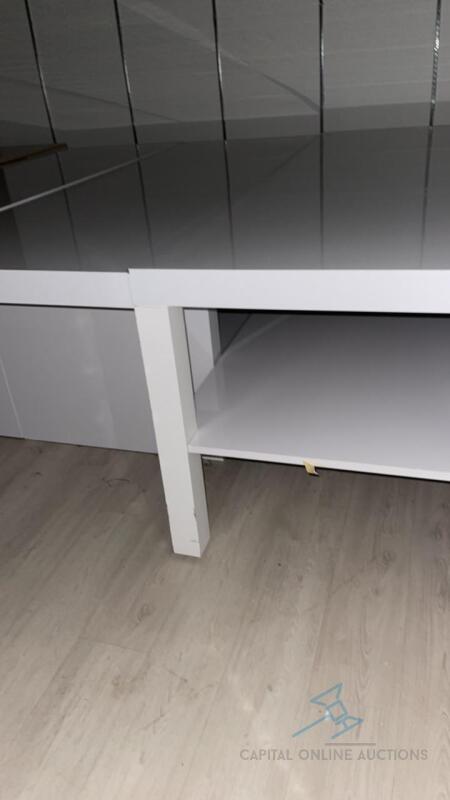 3 White tables with shelving units underneath