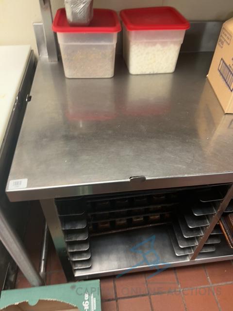 Stainless steel table with loaf pans