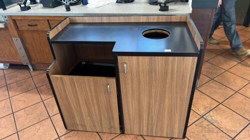 Trash receptacle with tray holder and cabinets