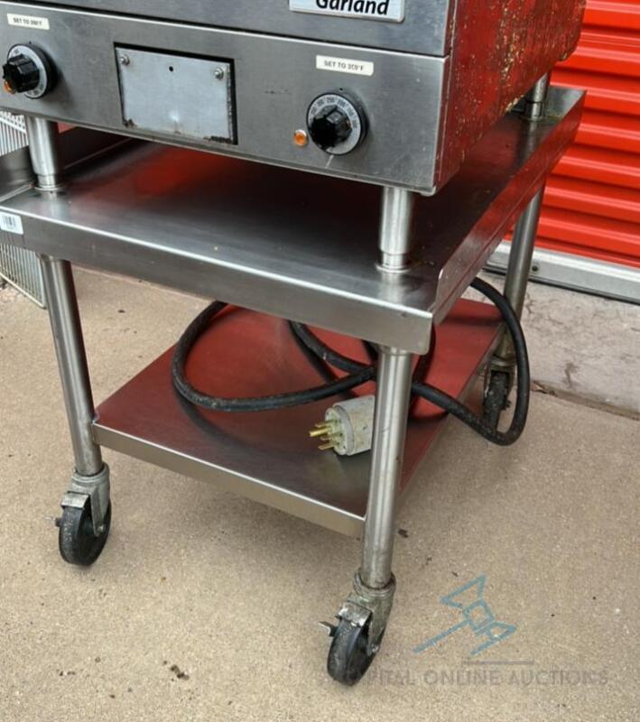 30” x 24” Stainless steel rolling table