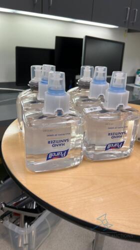 6 Purell Hand Sanitizer Bottles, 4 Boxes of Antimicrobial Hand Wipes, 1 Non-Contact Forehead Thermometer