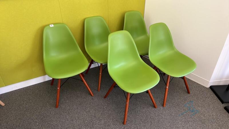 5 Green plastic chairs