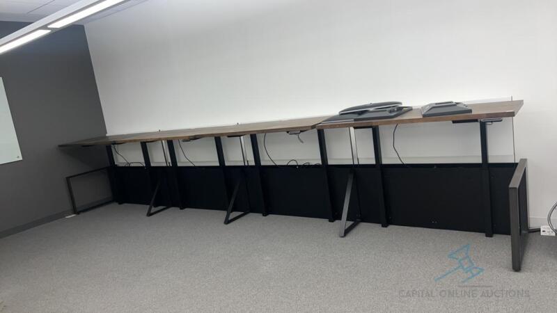 4 high low desks with 4 monitors