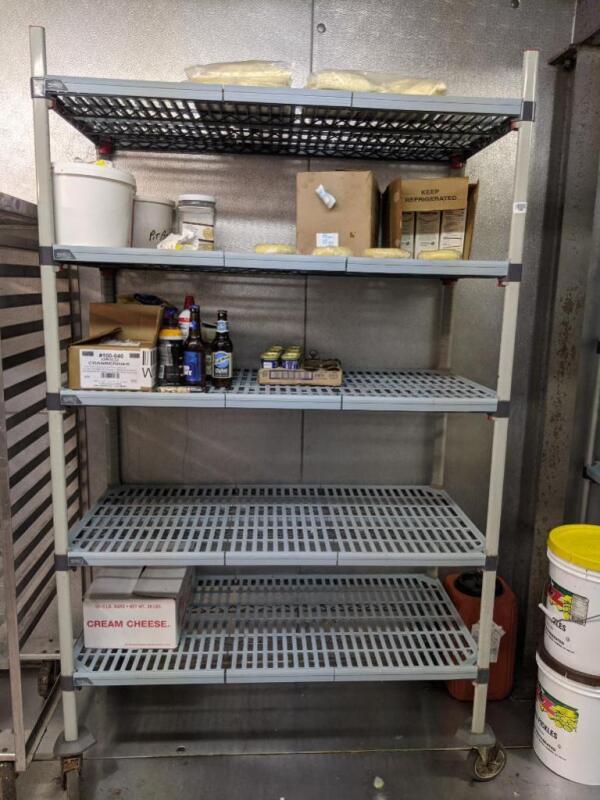 Plastic shelving unit on wheels