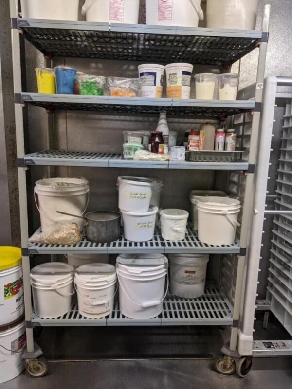 Plastic shelving unit on wheels