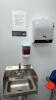 Handwash station with sink soap and paper towel dispenser