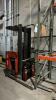 Raymond standup reach forklift with charger - 5