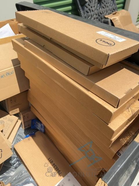 Pallet of misc items (includes multiple keyboards)