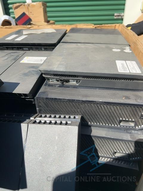 Pallet of misc game consoles