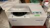 Eppendorf Centrifuge on table with miscellaneous parts - 2