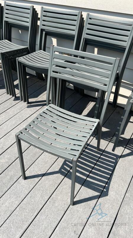 (4) Metal stacking patio chairs