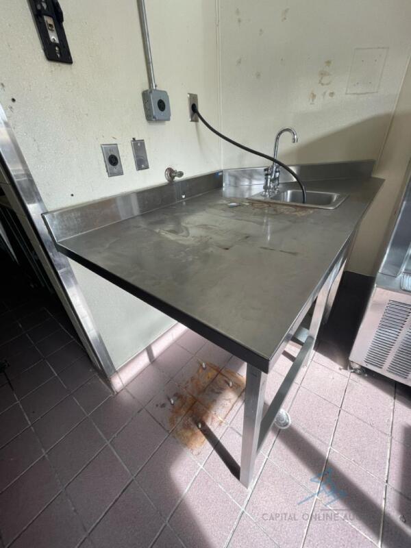 Stainless steel table with built in sink