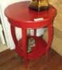 Red round side table