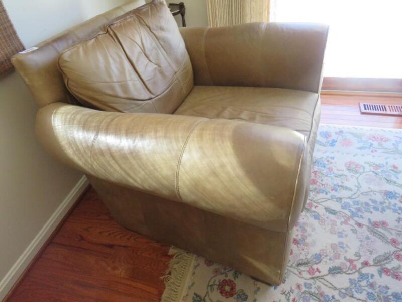 "Leather" arm chair and ottoman