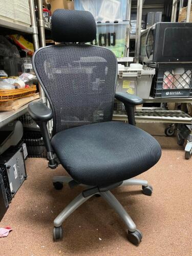 Single Black Chair on Wheels with Back Support