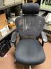 Single Black Chair on Wheels with Back Support - 2