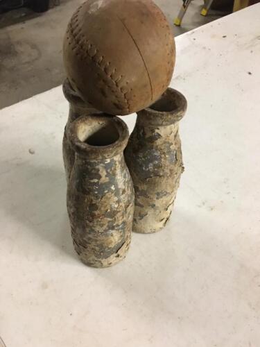 Three Antique weighed milk bottles with 1 ball