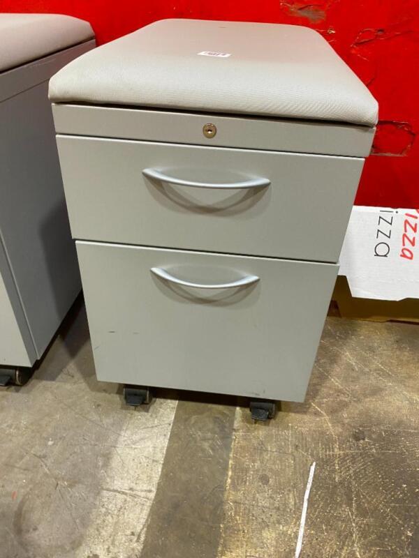 6 Filing Cabinets with padded top and wheels