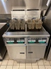 Dual fryer system with built in filtration