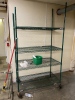 Green shelving unit on wheels