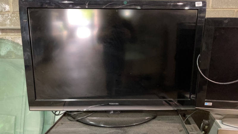Toshiba 46” TV and Black Rolling Cart