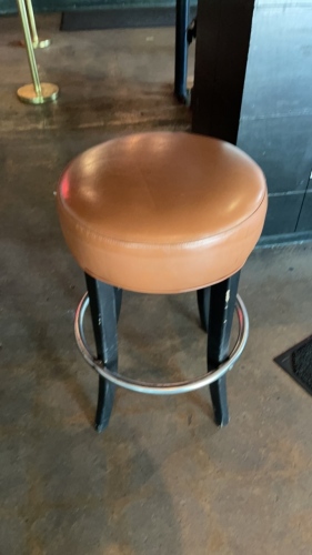 23 Main Room Orange Bar Stools