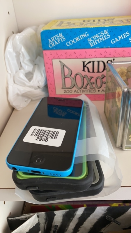 Blue iPhone 5C with 2 cases